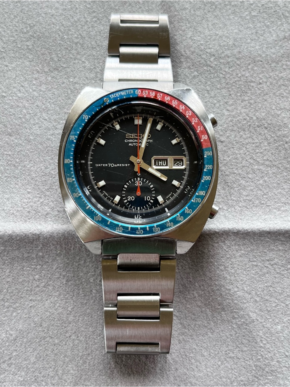 Seiko Stainless Steel Chronograph Watch with Blue and Red Bezel